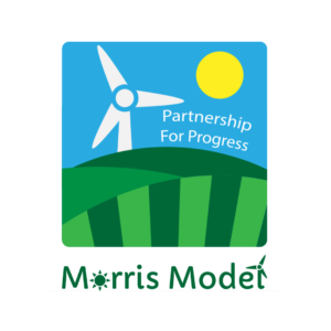 Morris Model logo. Green field with a white windmill and yellow sun. Says, "Partnership for Progress".