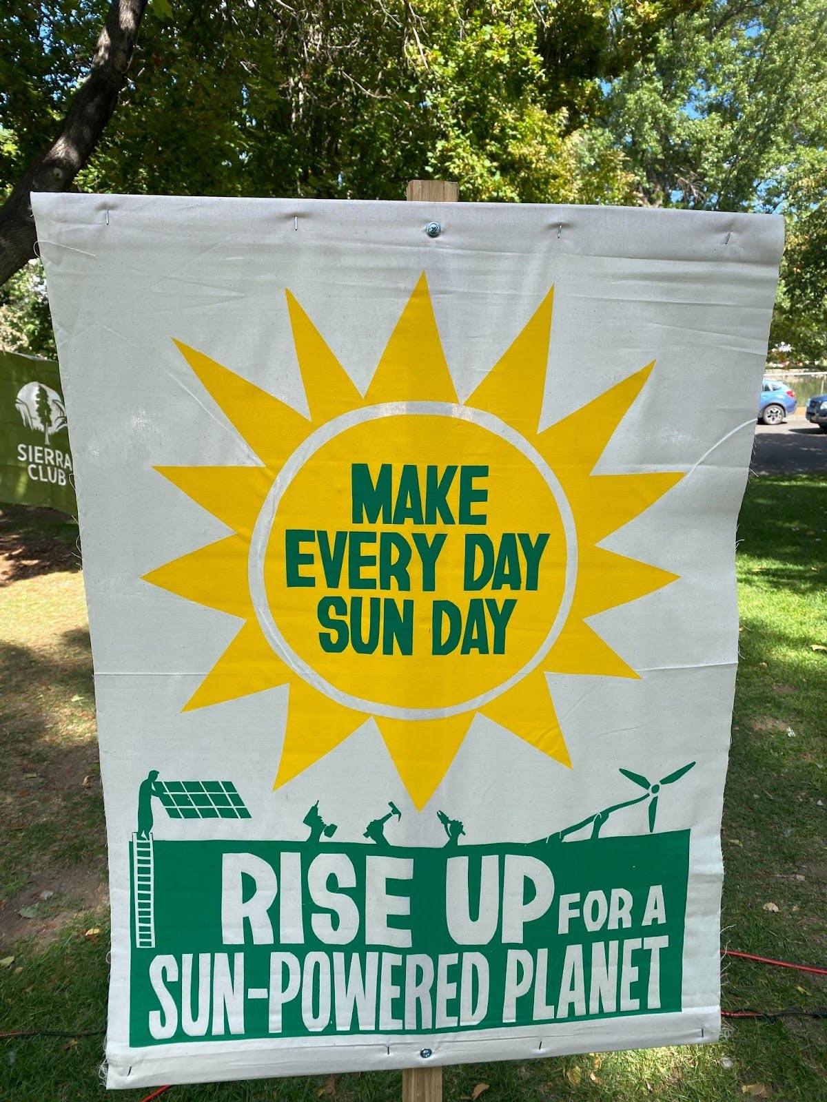 Sun day sign stating "Make every day Sun Day. Rise up for a sun-powered planet"